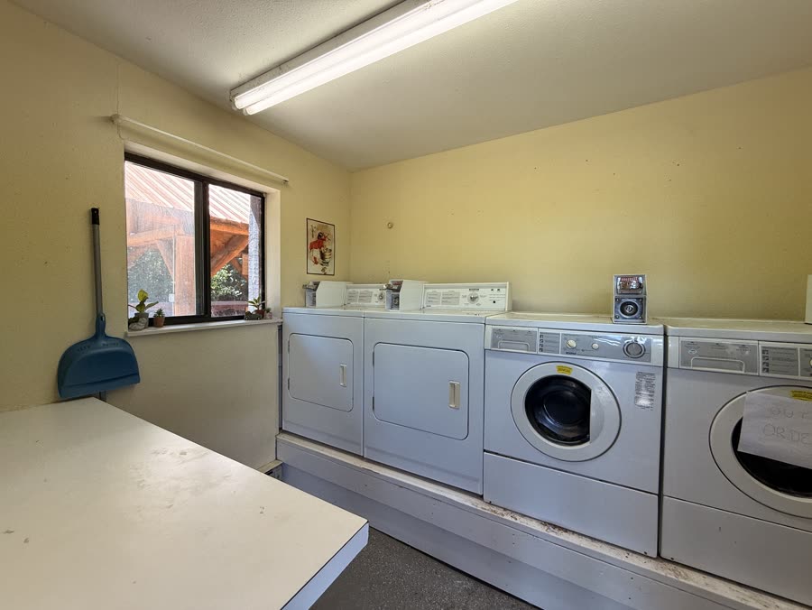 Guest laundry room with washers and dryers