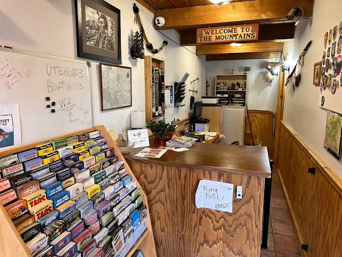 The front desk and brochure rack in the lodge office