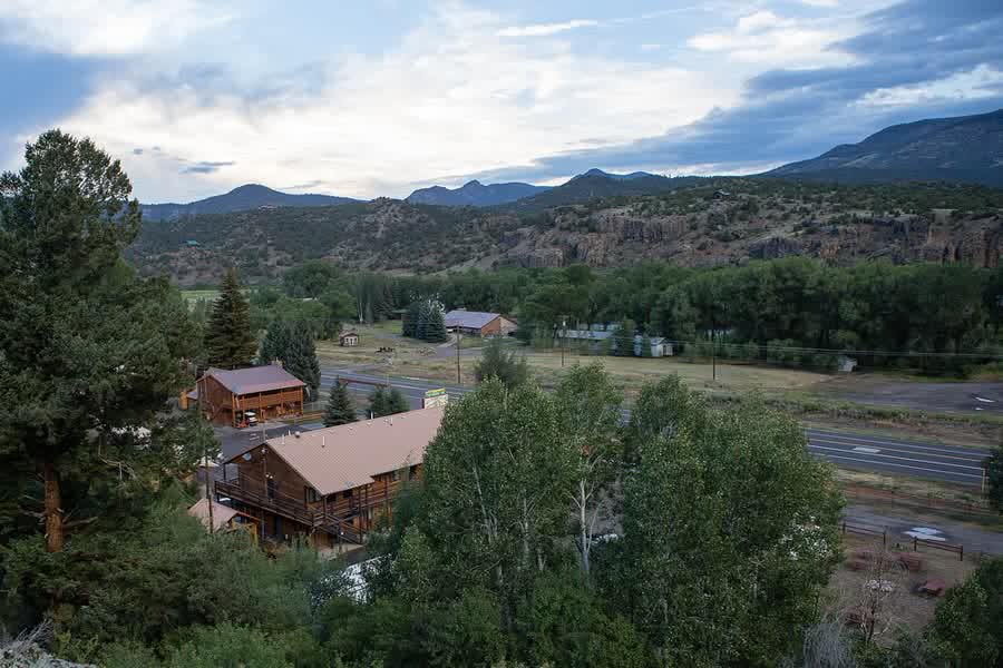 Elevated view over the lodge buildings and the valley